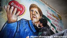 Syrien Binnish Wandgemälde für Merkel in Ruine